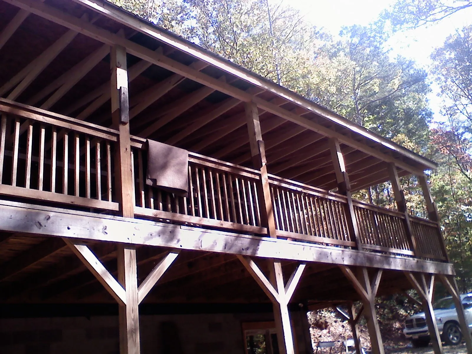 Timber framing under a new elevated porch and deck — Roof Leak Repair in Savonburg by Roofing Brothers